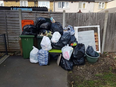Hampstead Skip Hire team delivering a skip