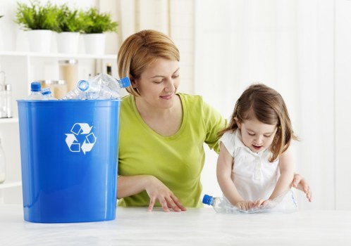 Team members responsibly disposing of household items